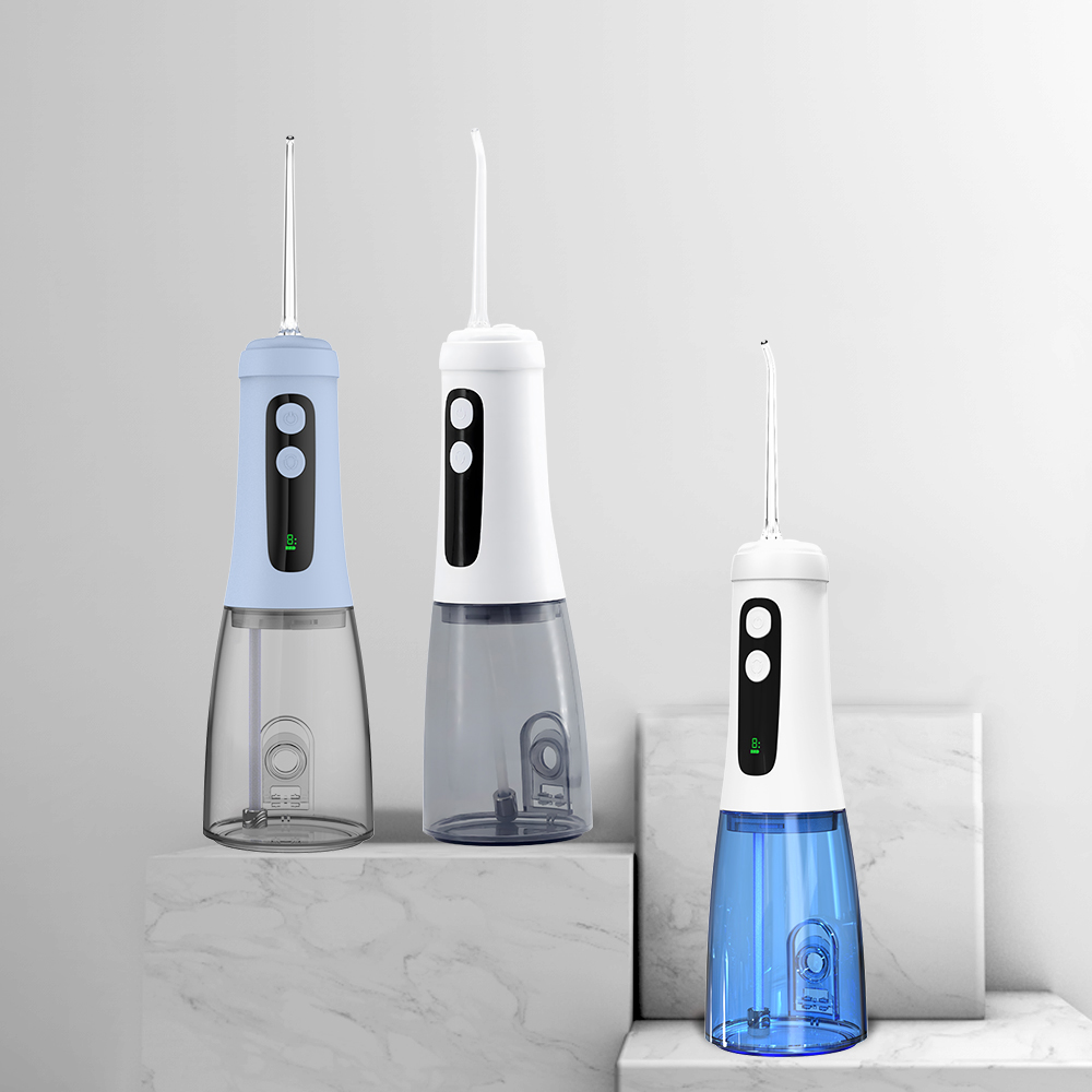 Wholesale Cordless Handheld Portable Electric Dental Water Flosser with 4 Nozzles